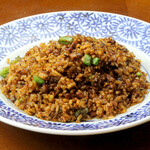 Black fried rice with Sichuan specialty greens and pine nuts
