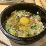 Tori Ichi Momme - 進化系極石焼親子丼￥1,200 店員さん（店長かも）の仕上げ後（混ぜてくれました） 接写