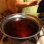 仙台名物 牛タン せり鍋 全席個室居酒屋 やぐら - お鍋に入ったせり鍋のだし！