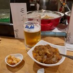 Hanashinobu - 生ビール、モツカレー、おやつ？は、差し入れです。カルディです。