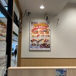 Hama sushi - 入り口横の壁の広告