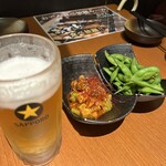 Kanzen Koshitsu Odento Yakitori Denden - お通し　枝豆  、アボカドキムチ、生ビール