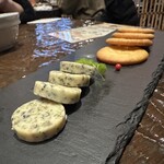 ドワ - 道産ツブのブルゴーニュ風チーズ600円