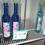 岡田本家 - 「葵の萌」…「いまいち萌えない娘」がラベルに描かれている。