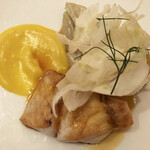 Benoit Alain Ducasse - スズキのポワレブイヤベースソース、ウイキョウとジャガイモ添え。食感と魚介の香りのアンサンブル