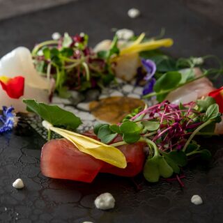 A delicate arrangement of seasonal local vegetables that rivals the main dish.