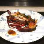 Teppanyaki Shichirigahama - 活伊勢海老と九条ネギのポワレ 玉味噌のグラチネ