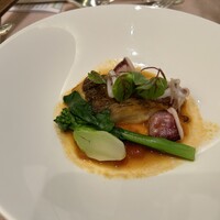 ホテル日航福岡 -  魚料理は五島の真鯛とヤリイカのポワレの甲殻類ソース。