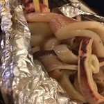 磯丸水産 - イカのワタ入りホイル包み焼き
