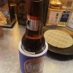 Mangeira Kakeru Sobasankaku - テカテ(800円) 現地で買ってきたというビール冷めないようにするやつ