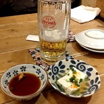 おきなわ食彩ダイニング 琉花 - オリオン生ビール530円とお通しはジーマミー豆腐　300円