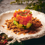 Salmon and avocado salad with shallot oil