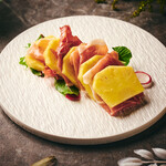 Seasonal fruit Prosciutto