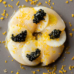 Scallop carpaccio with caviar and karasumi