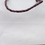 おかもと - 土産の袋