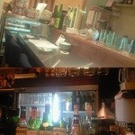 カウンター席。酒瓶やグラスでお洒落な居酒屋の雰囲気であり、納豆料理が名物だとは思えない意外性がまたいい