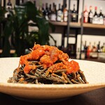 Spaghetti with firefly squid from Hyogo in tomato sauce and squid ink