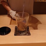 伯雲 - 河豚のヒレ酒のお替り。火を点けて薄っすら炎が。