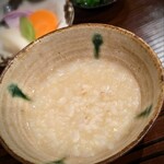 勢麟 - 河豚雑炊には、炊きたて土鍋ご飯のお焦げまで入って芳ばしい♪これは新たな驚き！