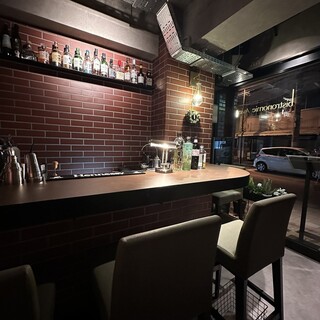 Bar counter surrounded by bricks