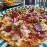 マドンナ - 結構、本格的なピザ。ファミレスより断然美味しい。