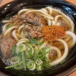 都そば - 肉うどん（七味唐辛子投入）