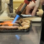 235117939 - 焼豚を炙ってますね〜♡