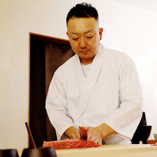 Owner Yuki Sato - Seasonal topics and Edomae techniques. With a heart of hospitality.