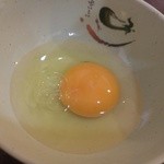 晴々飯店 - 生卵を頂きました。