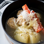 Whole onion soup with chicken dumplings and seasonal vegetables