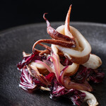 Stir-fried squid and radicchio with sweet and sour sauce