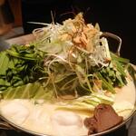 炭火野菜巻串と焼売 博多うずまき - モツ鍋