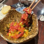 肉料理 安田 - “ユッケ”。生肉の臭みなんかまるで無し！目隠しされたら牛肉とは気づかないかも…。適度の粘り、噛み締めるとジワッと牛肉の風味が…。極めて上品なユッケ！