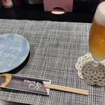 家庭料理　お家 - 乾杯～。お隣にはデッカイかにが・・・