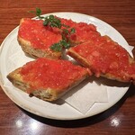 マルコナ - ■パン・コン・トマテ　¥800
トマトのガーリックトーストです。
こちらのパンコントマテを食べたら他では食べれません！