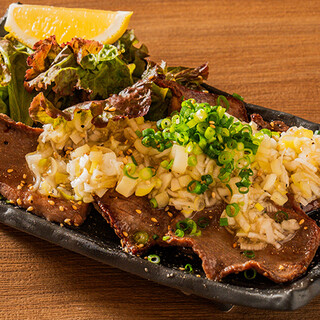 <Grilled Cow tongue with Green Onion Salt> A special dish of Cow tongue seasoned with special green onion salt.