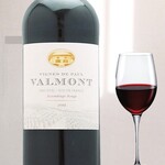 Glass of red wine (Valmont)