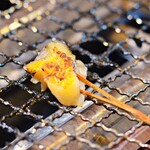 Sea urchin grilled skewers of red sea bream