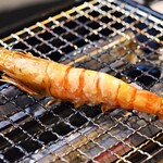 Shrimp skewers with heads