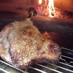 ルチアーノ - 薪窯仕立てのフランス産鴨もも肉