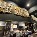 Japanese Sake Bar WASABI - 店内風景　1階　壁に名刺が貼ってある