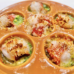 Oven-roasted octopus escargot with butter