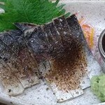 Finished with straw-grilled mackerel