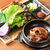韓国家庭料理 つつむ - 料理写真:シャキシャキ食感の葉野菜に包んでいただく『スタミナ豚カルビ（2人前〜）』