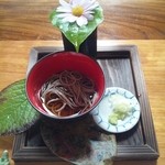 田舎料理おかりば - 花を取ると中にとろろが入ってます。