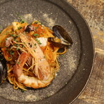 Tomato pasta with red shrimp and mussels