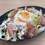 Caesar salad with Prosciutto and soft-boiled eggs