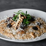 “Cream risotto with truffles and porcini”