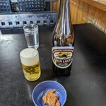 Owariya - ビール・お通しの「イカ塩辛」
