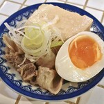 237256701 - 名物。牛すじ豆腐塩煮込み（トッピング塩卵）